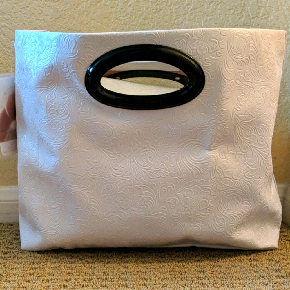 White leather handbag